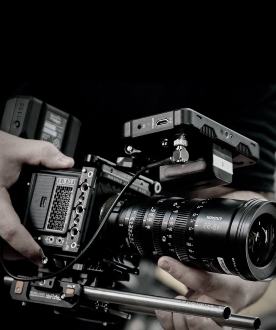 Team collaborating on set during a corporate video production