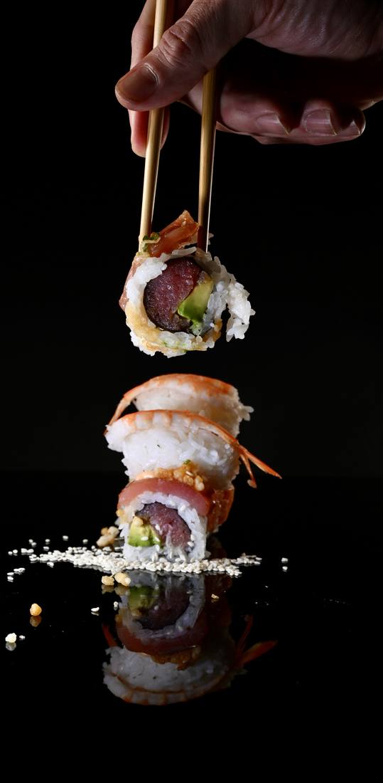 Sushi tower lit against black for a restaurant campaign